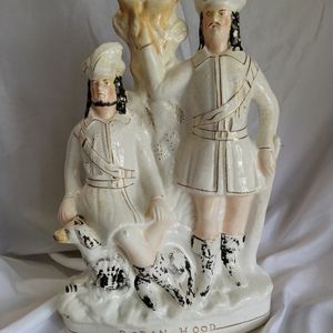 Spill vase form depicting Robin Hood and merry man with black and white hound re